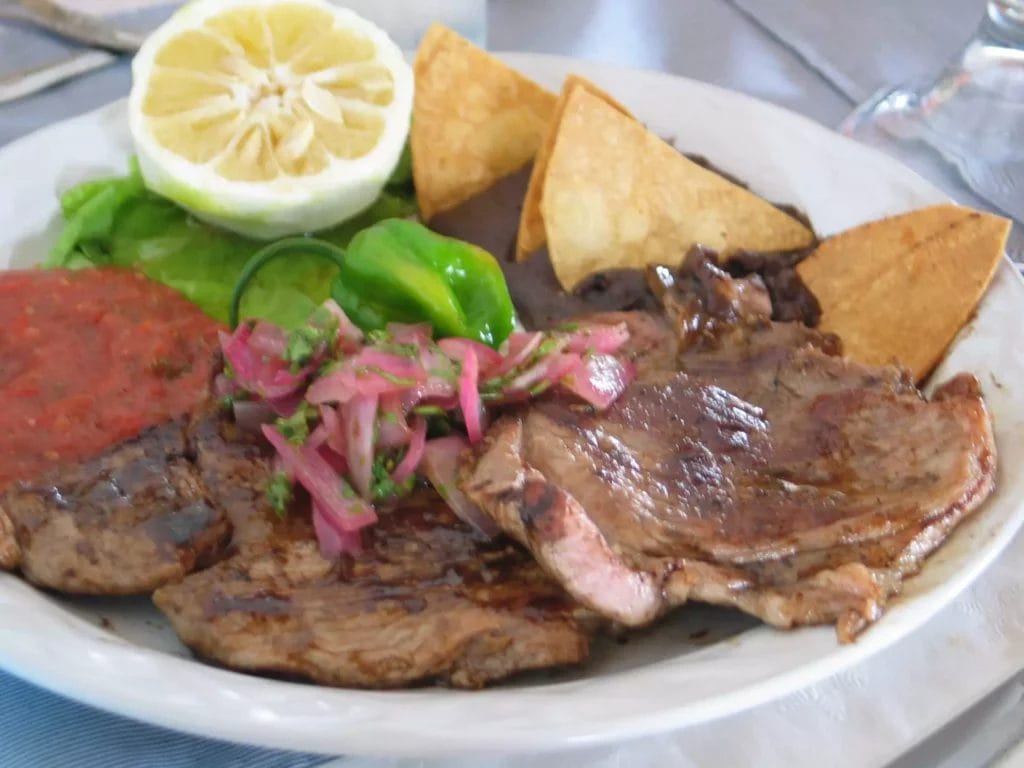 El Poc Chuc es básicamente carne marinada asada al carbón